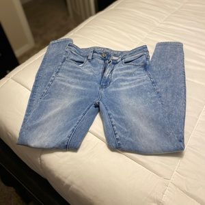 Medium color acid wash super hi-rise jegging